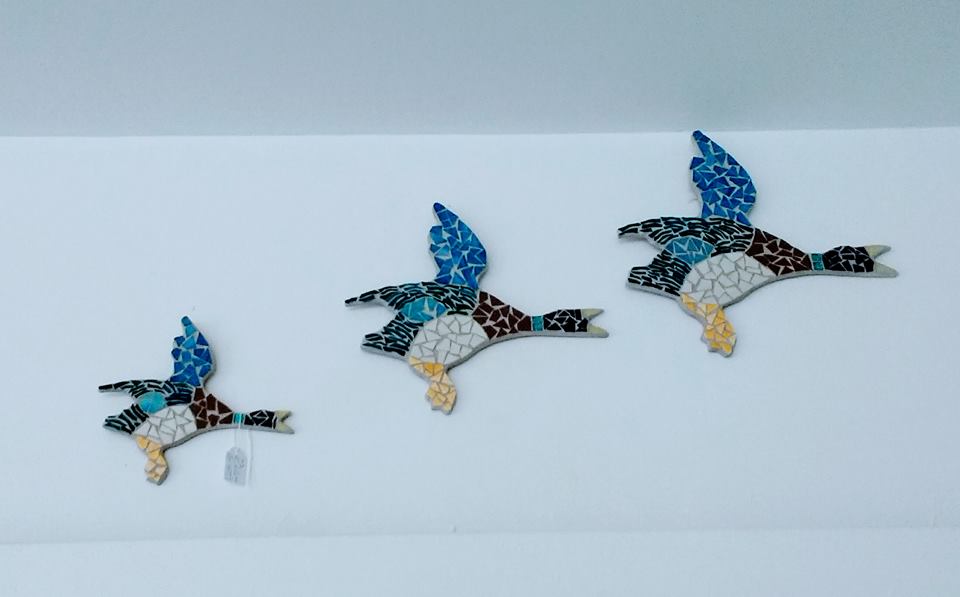 Set of 3 flying ducks, glass & ceramic tile on wooden base.