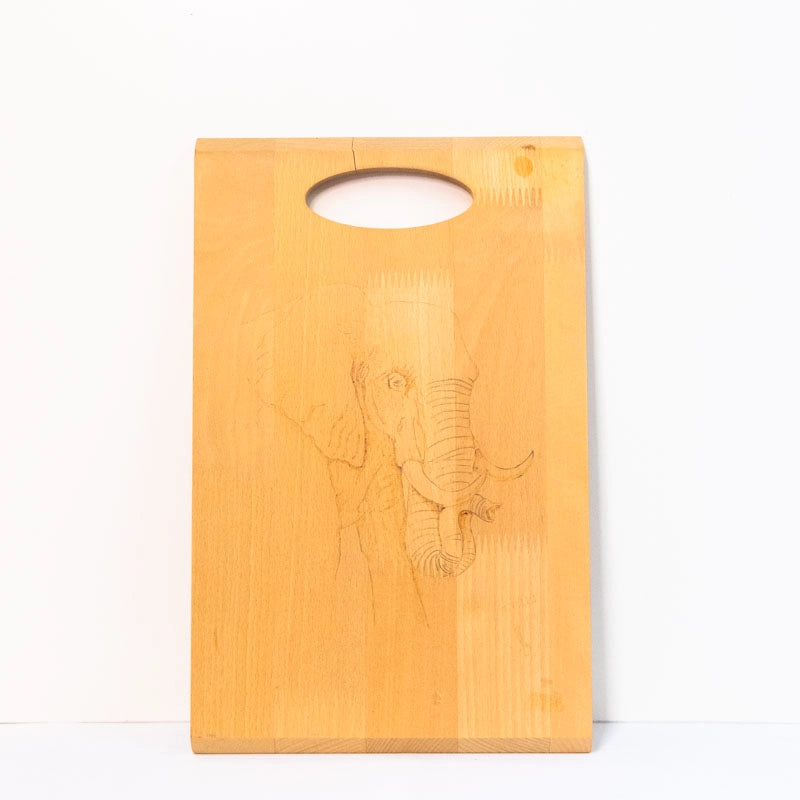 Beachwood chopping board woodburnt with Bull Elephant picture.  14” x 9”. 36cm x 23cm