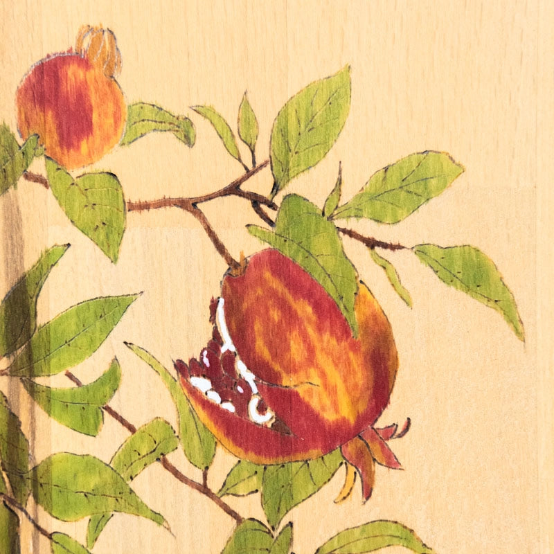 Chopping board pomegranate