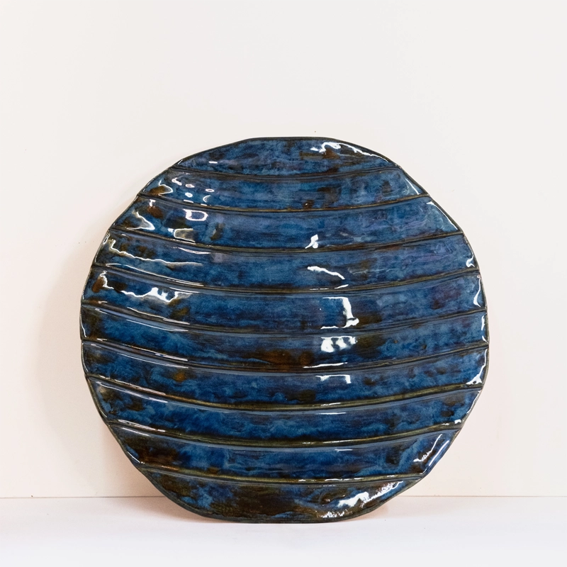 Large ceramic overlaid platter dish, finished in blue/brown.
