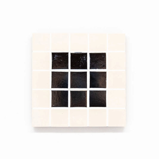 Set of 4 coasters. Ceramic and glass tile.  A decorative addition  to your home.  Each coaster 10X 10cms.  ﻿White/black