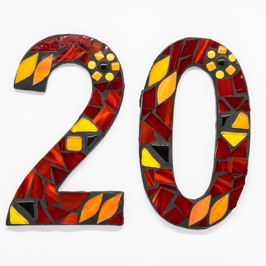 Small house number in red/yellow/black..