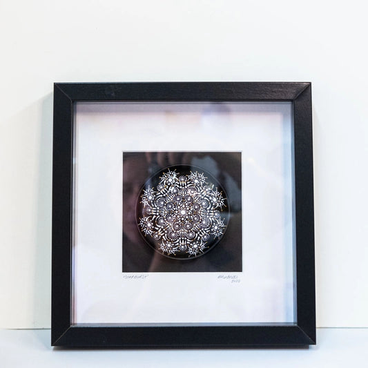Elegant and beautiful, original, hand-painted in Mandala style.  Handmade stone using plaster and a mould.  Painted using quality acrylic paints in white and gold, covered in resin.  Mounted on a black background with a white mount/matt in a deep, black box frame.