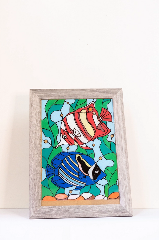 Painting on glass, depicting abstract fish among seaweed. 14” x 10”, 35cm x 25cm.