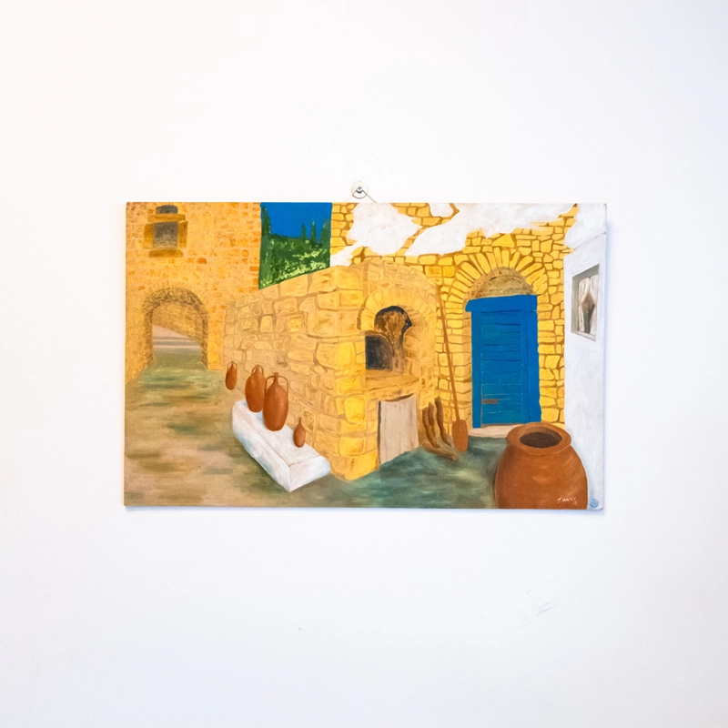 Oil painting on board depicting a traditional Cypriot village courtyard. 22” x 14”, 57cm x 36cm.